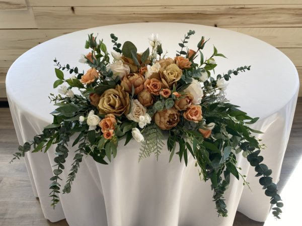silk floral head table arrangement