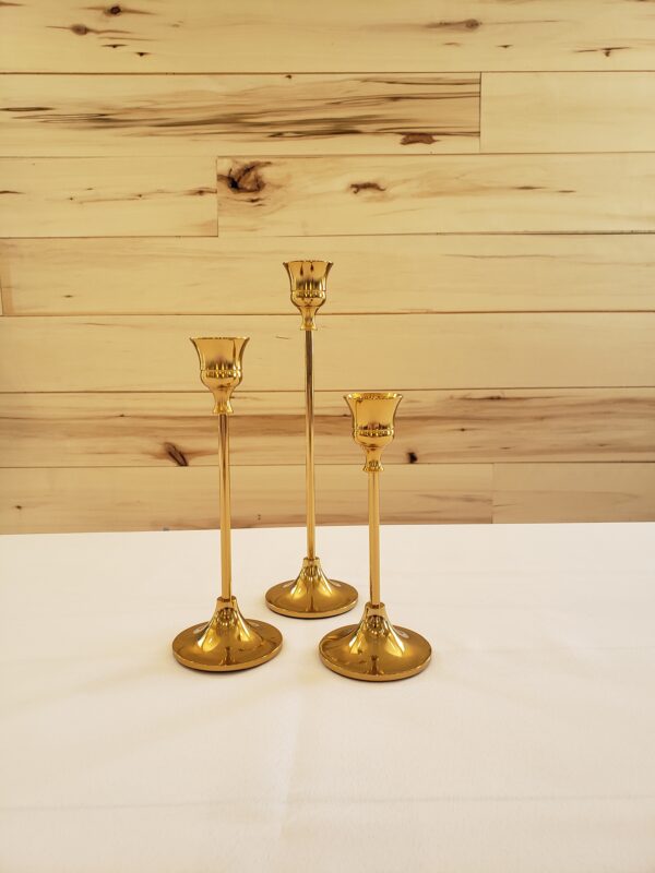 three tiered gold taper candle holders