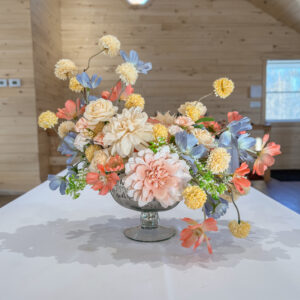 pink blue and yellow silk floral arrangement