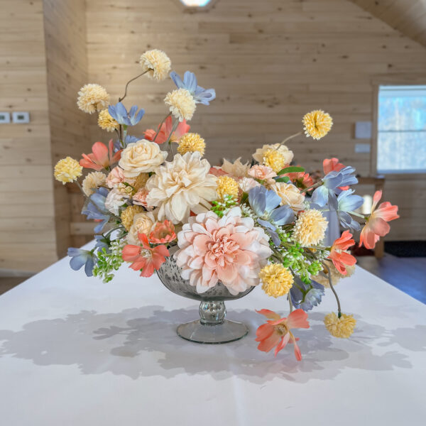 pink blue and yellow silk floral arrangement